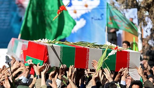 خاکسپاری پیکر دو شهید گمنام در منطقه چهارم دریایی سپاه بوشهر