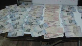 دستگیری جاعلان چک پول در لاهیجان