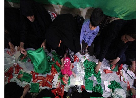 توزیع هزار دست لباس ویژه همایش شیرخوارگان حسینی