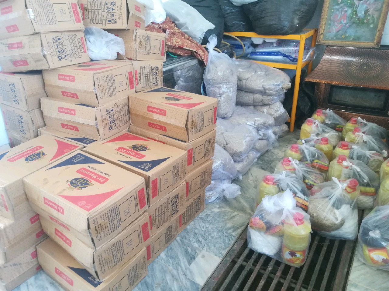 توزیع  بسته کمک های نیکوکارکویتی به نیازمندان زبرخان