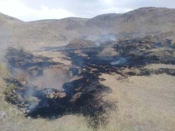 مهار آتش سوزی در اراضی کوهستانی روستای سرخ آباد بایگ