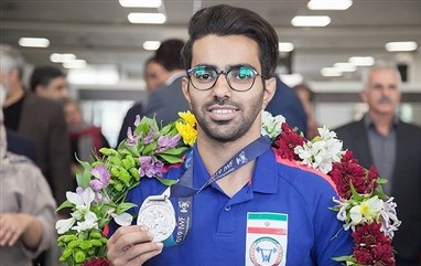 بازگشت نایب قهرمان سبک وزن وزنه برداری جهان به زادگاهش کرمانشاه