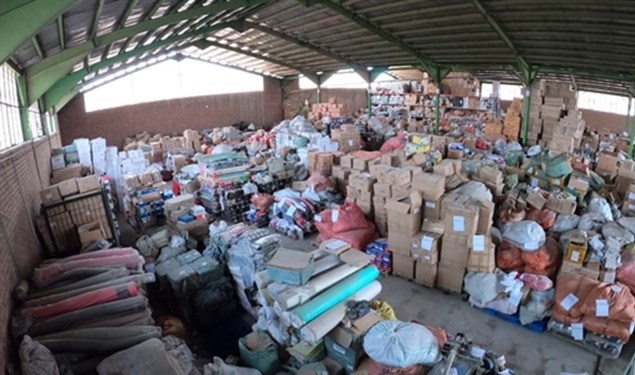 توزیع بخشی از کالاهای انبارهای تملیکی بوشهر بین نیازمندان