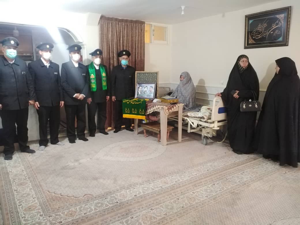 اهدای پرچم متبرک استان قدس رضوی به خانواده شهید علیمردانی