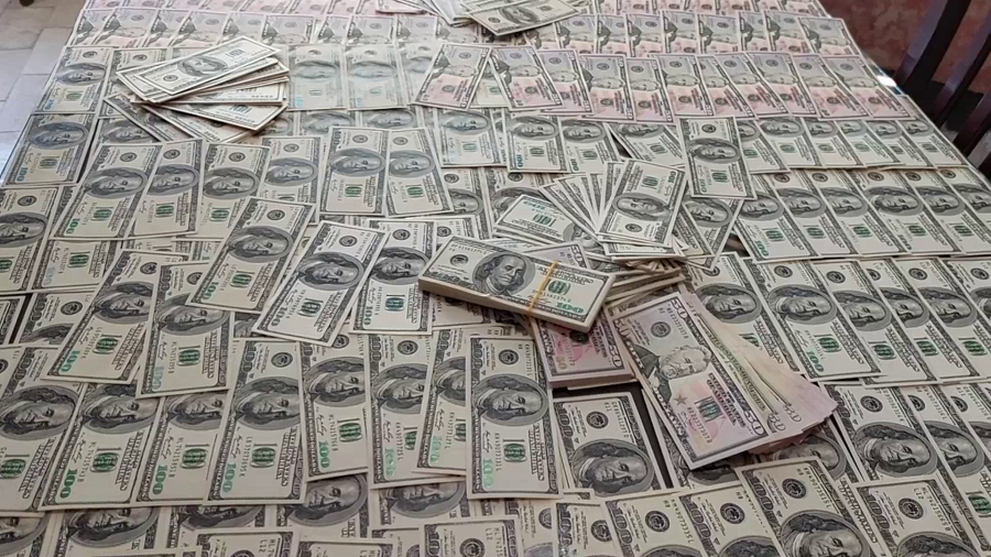 کشف بیش از 72 هزار اسکناس دلار تقلبی در ملکان