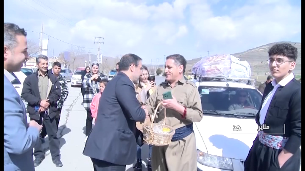 مراسم استقبال از مسافران نوروزی در ورودی ملایر برگزار شد