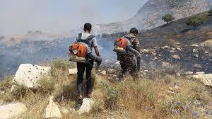 مهار آتش سوزی منطقه شلال دان در شهرستان باشت