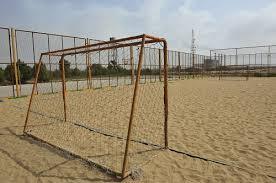 بهسازی زمین فوتبال ساحلی روستا کاهکش